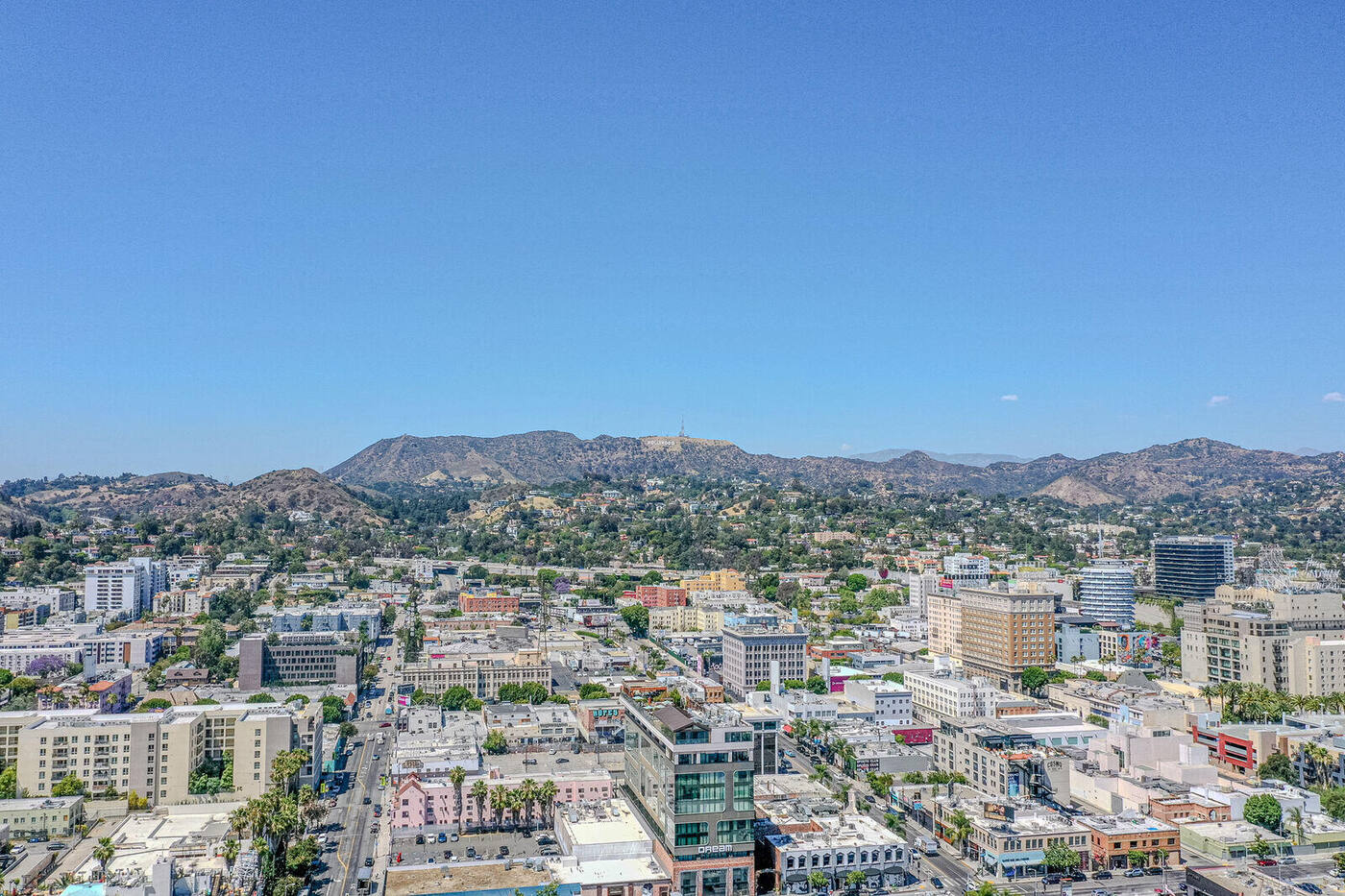 Panoramic view from the future rooftop level of 6445 W. Sunset Boulevard showing the Hollywood Sign, Hollywood Hills, Dream Hollywood, and Capitol Records area